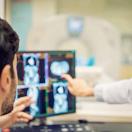 Doctors looking at X-ray on a screen