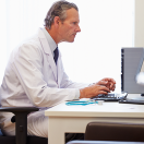 Doctor using a computer.