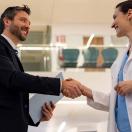 Doctor shaking hands with executive