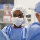 Healthcare workers in scrubs and face masks