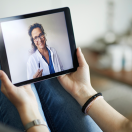 Woman attending telehealth appointment