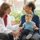 Doctor meeting with patients.