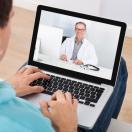 doctor on video call with patient