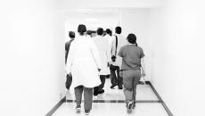 Medical staff walking down a hallway