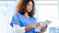 Nurse using tablet