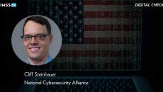 Cliff Steinhauer at the National Cybersecurity Alliance_Laptop with American flag and binary code Photo by Smederevac/iStock/Getty Images Plus