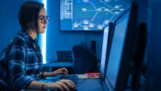 Person working at computer screen