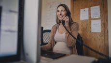 Pregnant person talking on the phone