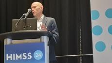 Geoffrey Roche, director of workforce development at Siemens Healthineers, speaks at HIMSS24 in Orlando Monday.