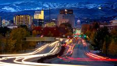 Idaho scene, city buildings below mountain range