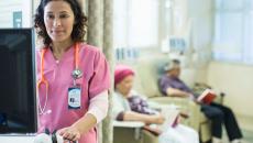 Doctor working in infusion room