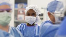 Healthcare workers in scrubs and face masks