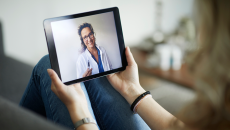 Woman attending telehealth appointment