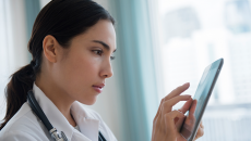 Doctor using a tablet