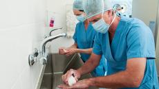 Surgeons washing hands