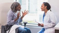 Patient talking to doctor