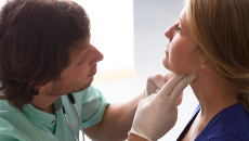 Doctor examining patient.