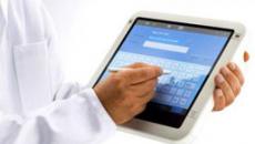 doc on tablet EHR