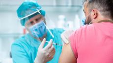 A patient receives a vaccine