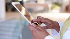 A doctor using a digital tablet