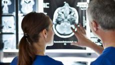 Clinicians look at diagnostic imaging