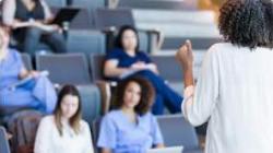 medical workers sitting in a lecture hall