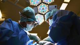 Two surgeons operating