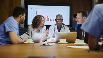 Healthcare workers in a meeting