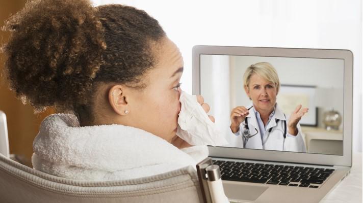 Telemedicine consultation with sick patient