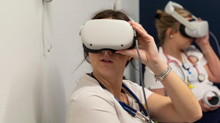 University of Rochester Nursing students use VR headsets to train and prep for exams.