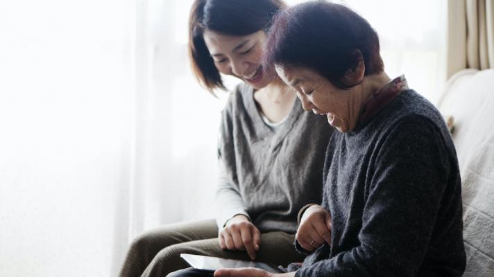 family watching a tablet together