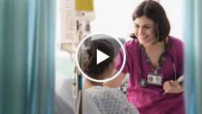 Healthcare worker talking to patient